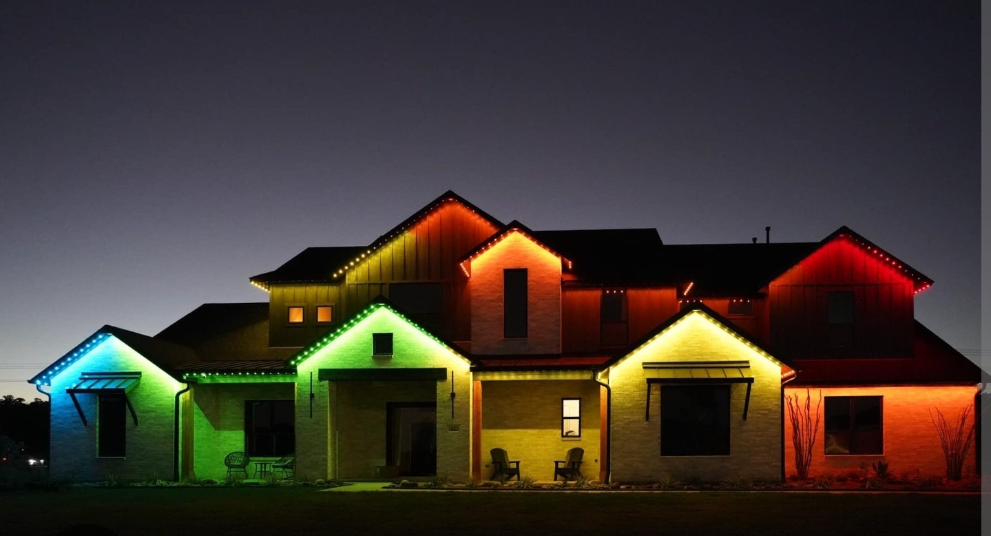 Elegant white permanent outdoor lighting on roofline