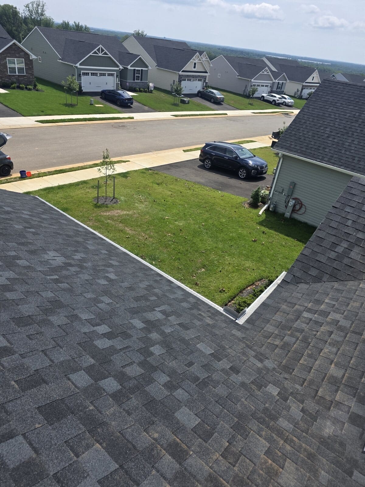 Wide view of a completed residential gutter guard installation in Aberdeen, Maryland