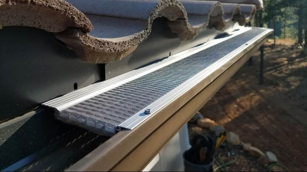 LeafBlaster Pro by GutterGlove micro-mesh guard installed on tile roof