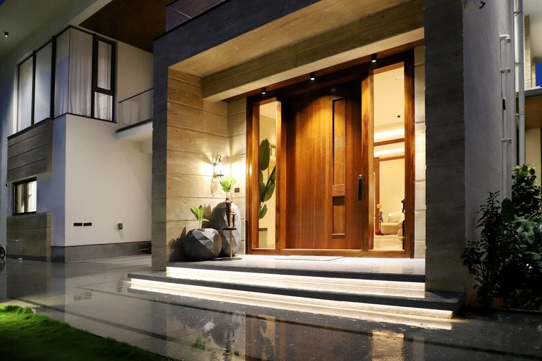 Modern South Jersey home with permanent LED roofline lighting and architectural outdoor lighting at dusk