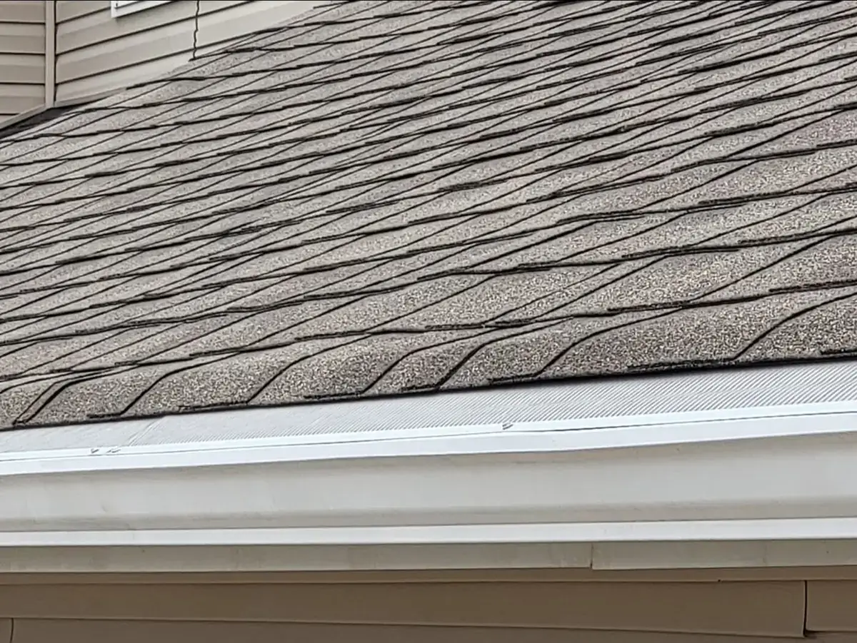 Actual CleanGutters micro-mesh gutter guard installation detail