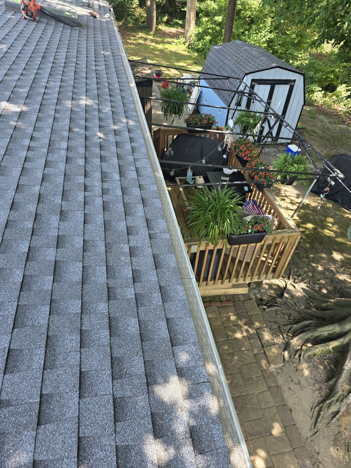 Continuous gutter guard coverage along a residential roofline in West Deptford, New Jersey